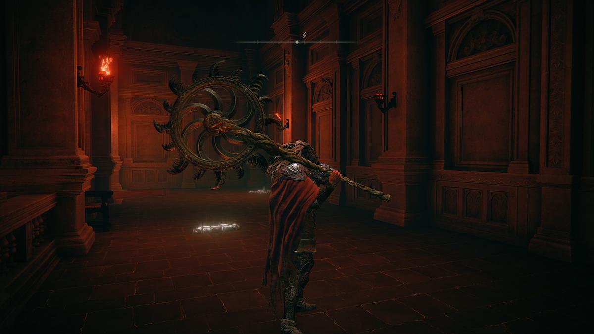 Screenshot of Elden Ring showing Tarnished holding the Giza's Wheel weapon