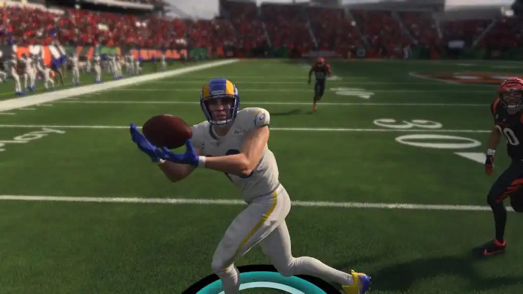 an image of LA Rams WR Cooper Kupp catching a pass