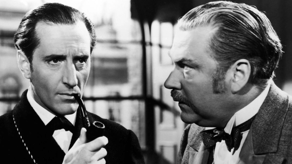 Black and white film still of a 1940's Sherlock Holmes film.