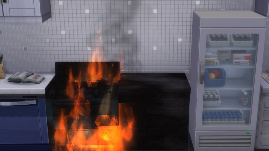 A blackened Sims stove and countertop smoke and are engulfed in flames.