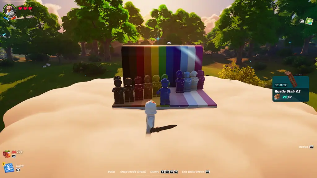 A rainbow lego set with dancing figures atop a cloud at the end of a rainbow in LEGO Fortnite.