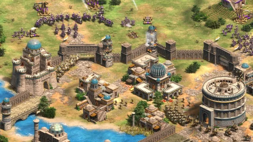 Age of Empires II Screenshot showing a walled civilization being attacked
