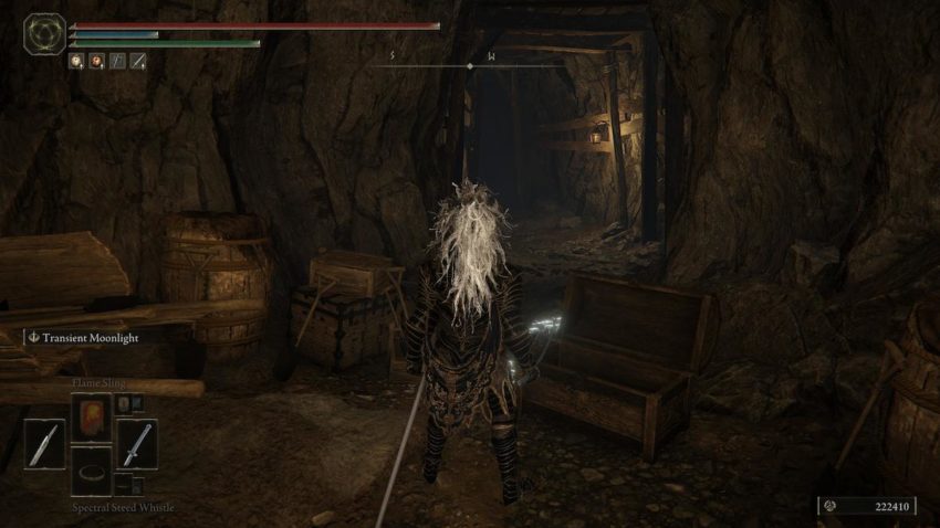Screenshot of Elden Ring showing a hidden path behind a treasure chest.