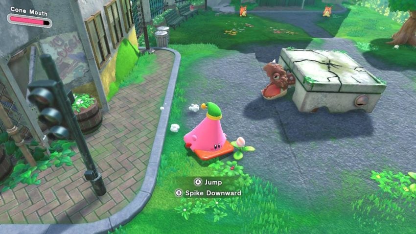 Screenshot of Kirby and the Forgotten Land showing Kirby as a cone about to fight a turtle