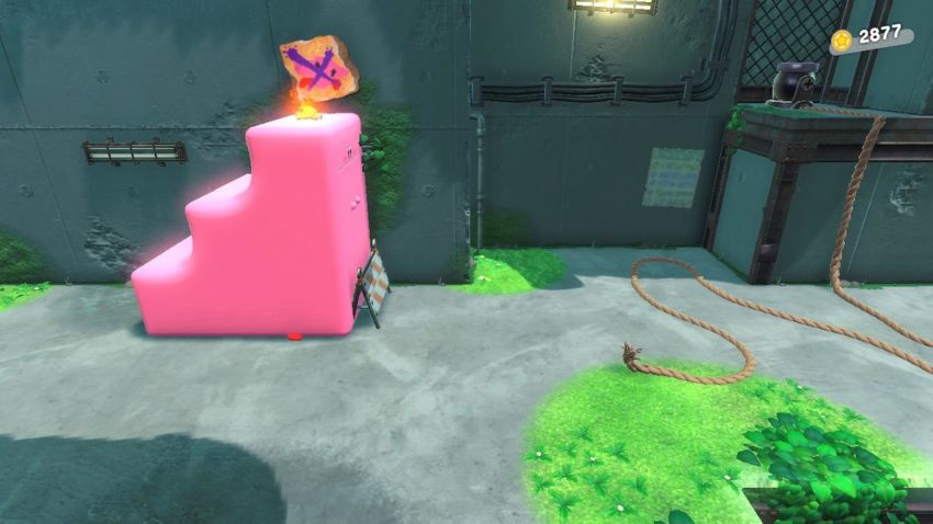 Stair Kirby stands below a Kirby wanted poster