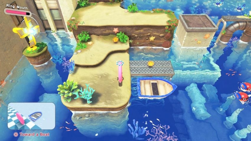 Kirby stands in front of a boat