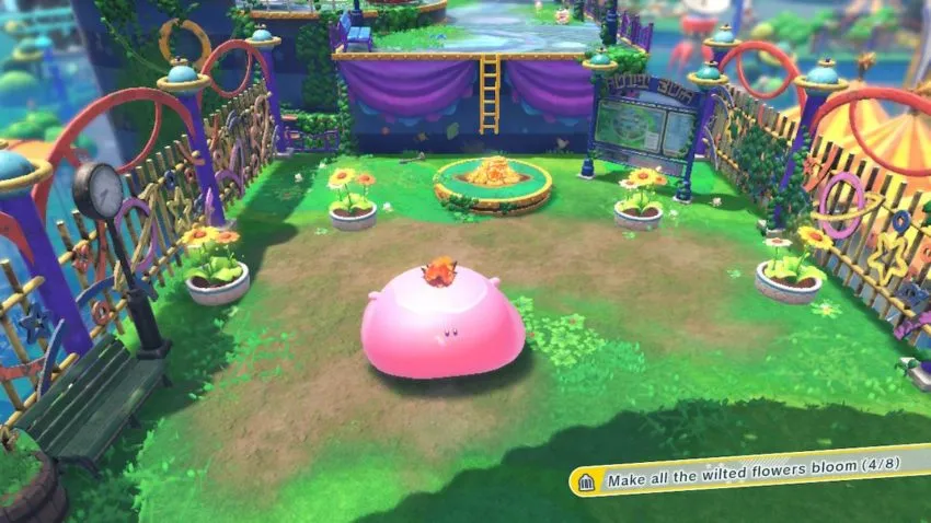 Kirby stands in front of four flowers
