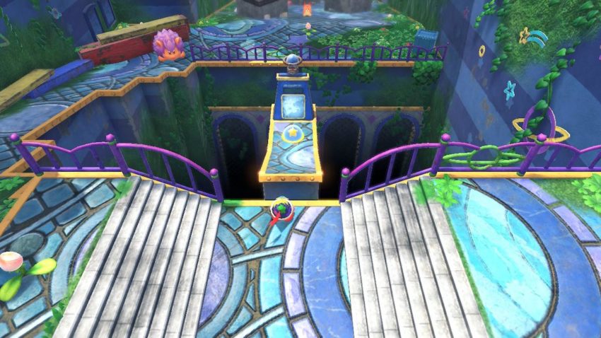 Kirby stands across from a platform with a switch on it