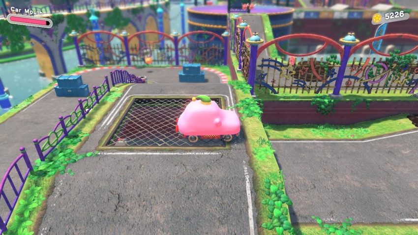 Car Kirby prepares to go off a ramp to take a shortcut