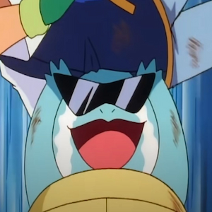 Squirtle crying and holding Ash up